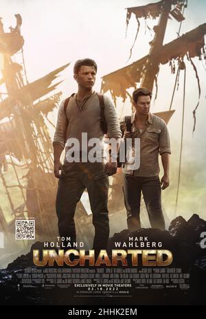 uncharted-from-left-tom-holland-mark-wahlberg-2022-ph-clay-enos