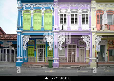 George Town, Penang, Malaysia - Jan 3rd 2022: Row of colorful heritage houses and shops in George Town, Stock Photo