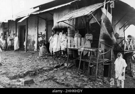 Abyssinian War September 1935Families of Addis Ababa pose outside their houses as tribesmen and chieftains arrive in Addis Ababa to pledge there loyalty to emperor Haile Selassie following the invasion of Ethiopia by Italian forces Stock Photo