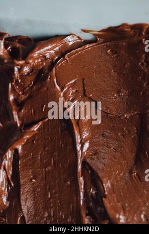 close up of creamy chocolate fudge with white background Stock Photo
