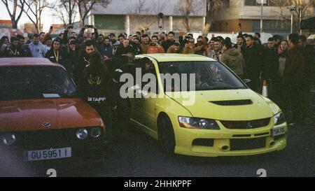 Nice classic red BMW E30 in a concentration of tuned cars Stock Photo