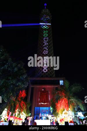 Cairo. 24th Jan, 2022. Photo taken on Jan. 24, 2022 shows the Cairo Tower during a light show in Cairo, Egypt. A light show was held at the Cairo Tower for the upcoming Beijing 2022 Winter Olympics. Credit: Wang Dongzhen/Xinhua/Alamy Live News Stock Photo