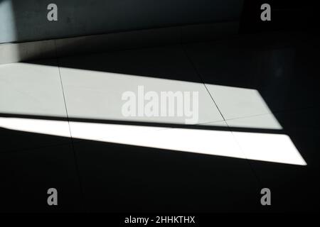 the shadow of the light from behind the window Stock Photo