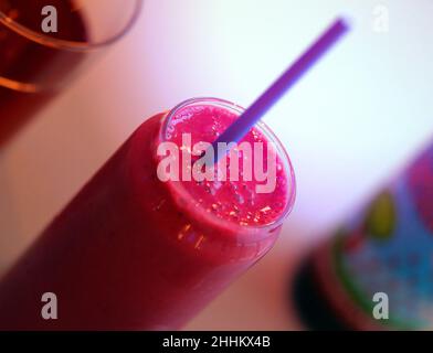 Photo smoothies with raspberries and banana in a cafe Stock Photo
