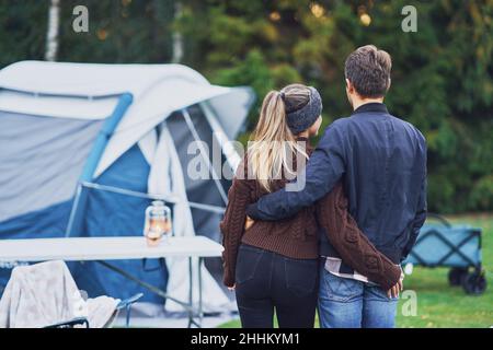 Young nice couple having fun on camping Stock Photo