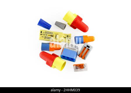 A collection of wire nuts and wire connectors isolated on a white background. cutout image for editorial and illustration use. Stock Photo