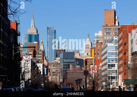 The slow obfuscation of the Midtown Manhattan NYC skyline as viewed from the Bowery, January 2022. Stock Photo