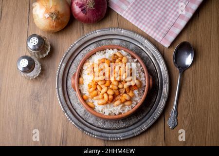 Traditional Turkish cuisine. Kuru Fasulye . Haricot Beans, rice and beans (Turkish name; pilav ustu kuru fasulye) Stock Photo