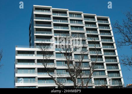 New build modern building closeup on blue sky background Stock Photo