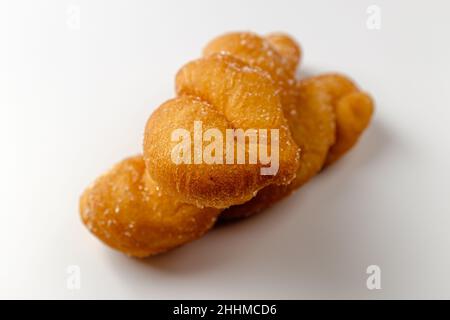 Twisted bread stick on white background Stock Photo