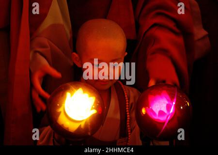 May 13, 2015 - South Korea, Seoul : Little Monks hold lanterns during a lighting ceremony to celebrate Buddha's upcoming birthday on May 25 at the Jogye Temple in Seoul, South Korea Wednesday, May 13, 2015.Nine children entered the temple to have an experience of monks' life for two weeks. (Ryu Seung-il / Polaris) Stock Photo