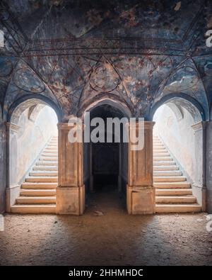 Staircase in an Abandoned Italian Derelict Farm House in Heavy Decay Stock Photo