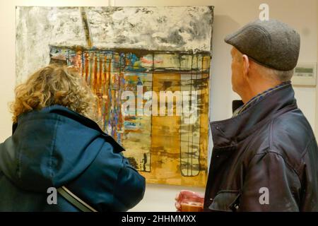 visitors at painting exposition in Holland Stock Photo