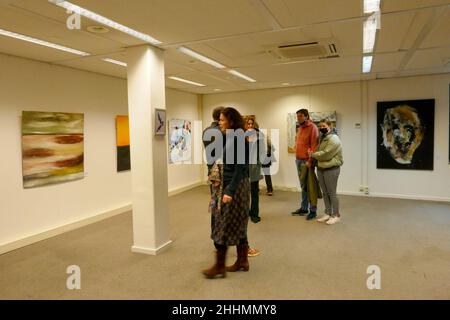 visitors at painting exposition in Holland Stock Photo