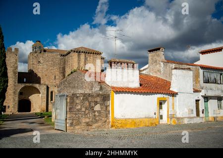 the Castelo and Monastery Santa Maria de Flor da Rosa in the old Town of Flor da Rosa in Alentejo in  Portugal.  Portugal, Estremoz, October, 2021 Stock Photo