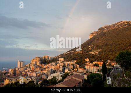 Rainbow over Monaco on sunrise, early summer morning from above Monaco village Stock Photo