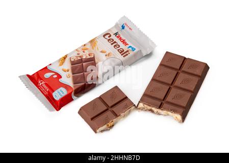 Alba, Italy - December 28, 2021: package of Kinder Cereali Ferrero with bar of milk chocolate stuffed with milk and puffed cereals isolated on white p Stock Photo