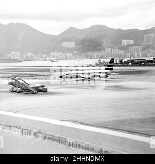 Kai Tak airport Hong Kong and a Convair 880M (22M-22) of Cathay Pacific