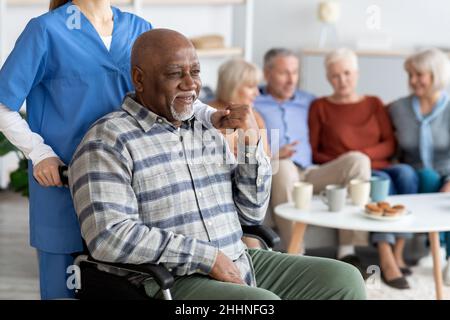 Disabled african american senior man in wheelchair Stock Photo