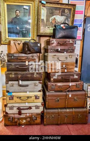 Old suitcases for sale at Barras weekend market in Glasgow. Stock Photo