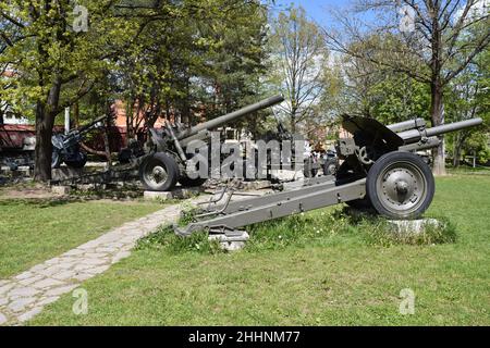 Several green coloured artillery cannons in Museum of the Slovak National Uprising- Stock Photo