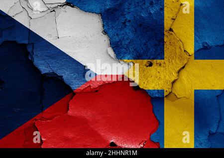 flags of Czechia and Sweden painted on cracked wall Stock Photo