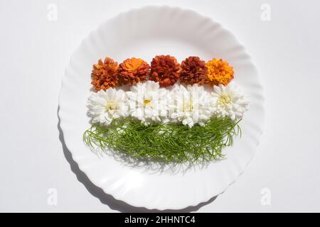 Triclour beautiful flowers with Orange and white chrysanthemum and leaf of concept of Indian flag on ocassion of Republic day and Independence day bac Stock Photo