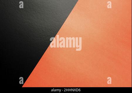 Black and orange textured paper geometric background. Multicolored paper. Creative flat layout with copy space. Stock Photo