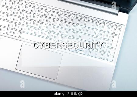 Cybersecurity word. Cyber security text on laptop computer. Stock Photo
