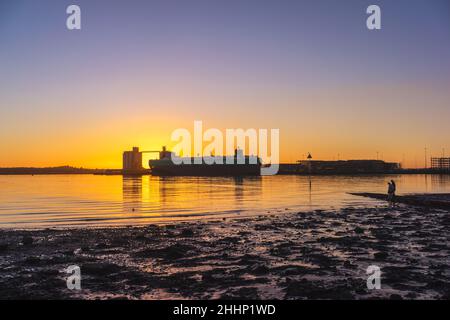 Sunset over Southampton Grain Terminal in the Eastern Docks, Southampton Water, Southampton, Hampshire, England, UK Stock Photo