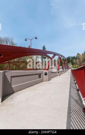 Closeup of the artistic arches showing how they are secured to the concrete barriers on the May Creek Bridge in Newcastle, Washington. Stock Photo