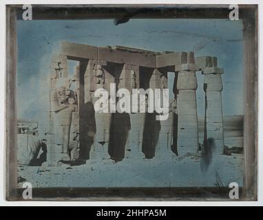 Ramesseum, Thebes (201. The?bes. 1844. 202 Rhamse?ion.) 1844 Joseph-Philibert Girault de Prangey The pillars of the thirteenth-century B.C. funerary temple of the pharaoh Rameses II, pictured here, incorporate figures of Osiris, the Egyptian god of death and resurrection. Before gilding the image, Girault purposefully swiped and erased the fragile image surface on all four sides, creating a handmade frame.. Ramesseum, Thebes (201. The?bes. 1844. 202 Rhamse?ion.). Joseph-Philibert Girault de Prangey (French, 1804–1892). 1844. Daguerreotype. Photographs Stock Photo
