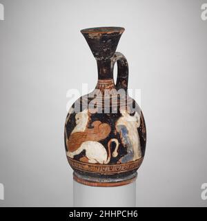 Terracotta squat lekythos (oil jar) early 4th century B.C. Greek, Attic Griffin between two women.. Terracotta squat lekythos (oil jar)  247362 Stock Photo