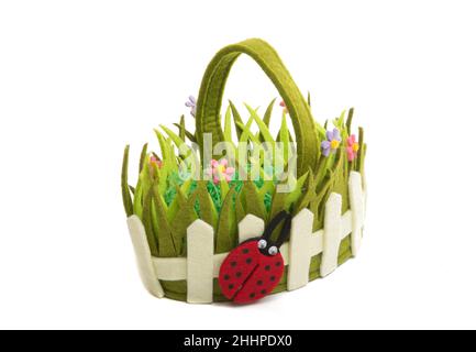 Easter basket with green paper filler isolated on white Stock Photo - Alamy