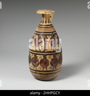Terracotta alabastron (perfume vase) ca. 590–570 B.C. Attributed to the Late Warrior Frieze Vases Two friezes of hoplites to right.. Terracotta alabastron (perfume vase)  247192 Stock Photo