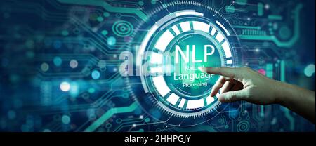 Businessman hand touching NLP hologram screen and technology background. Natural Language Processing cognitive computing technology concept. Stock Photo