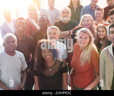 Group of business people smiling in an office Stock Photo