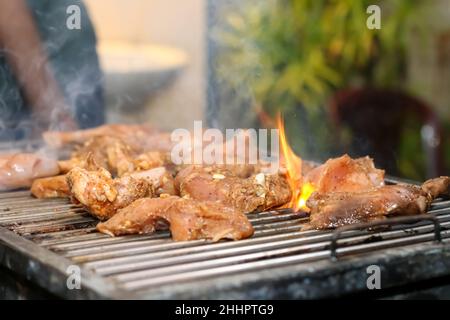 meat on skewers and cooked on a fire Stock Photo