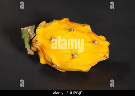 yellow dragon fruit on black background Stock Photo