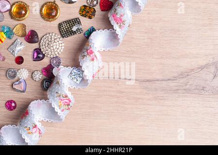 multi-colored sewn stones on a grey background.Copy Space Stock Photo
