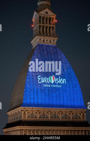 Eurovision Song Contest logo projected on the Mole Antonelliana. The 66th edition will be held in Turin in May 2022. Turin, Italy - January 2022 Stock Photo