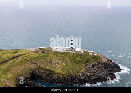 Kinsale, West Cork, Ireland. 25th Jan, 2022. On an overcast but mild day in West Cork, the Old Head of Kinsale lighthouse and Old Head 18 hole golf course stand on the coast of Ireland. Credit: AG News/Alamy Live News Stock Photo