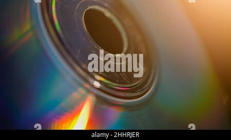 Macro shot of an old compact CD disk with sun rays Stock Photo