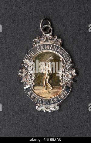 Camanachd Cup Winners Medal. Shinty's blue ribbon trophy, played for each season, and this is an image of the traditional winners medal. Stock Photo