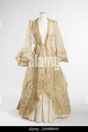 Evening dress ca. 1872 American This evening dress belonged to Amelia Beard  Hollenback (1844-1918) who was born and raised in Brooklyn and married the  prominent financier and philanthropist John Welles Hollenback (1835-1927)  in 1874. The dress 