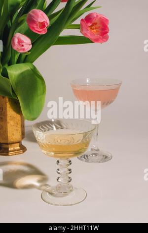 bright pink tulips with pink champagne Stock Photo