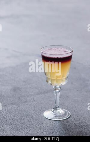 New York whiskey sour on concrete floor Stock Photo