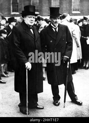 Britain's war time premiers. Winston Churchill with Neville Chamberlain in London on the occasion of the decoration with medals by his Majesty the King, of heroes of the River Plate Battle, when the German pocket battleship 'Graf Spee' was routed. February 1940. Stock Photo