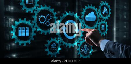 Update on virtual screen. Internet and technology concept. Man presses with his hand on the icon update. Stock Photo