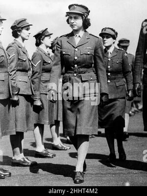 Princess Elizabeth as Junior Commander in the ATS inspecting The Motor Transport Training Centre at Camberley, Surrey.Circa May 1945. Stock Photo
